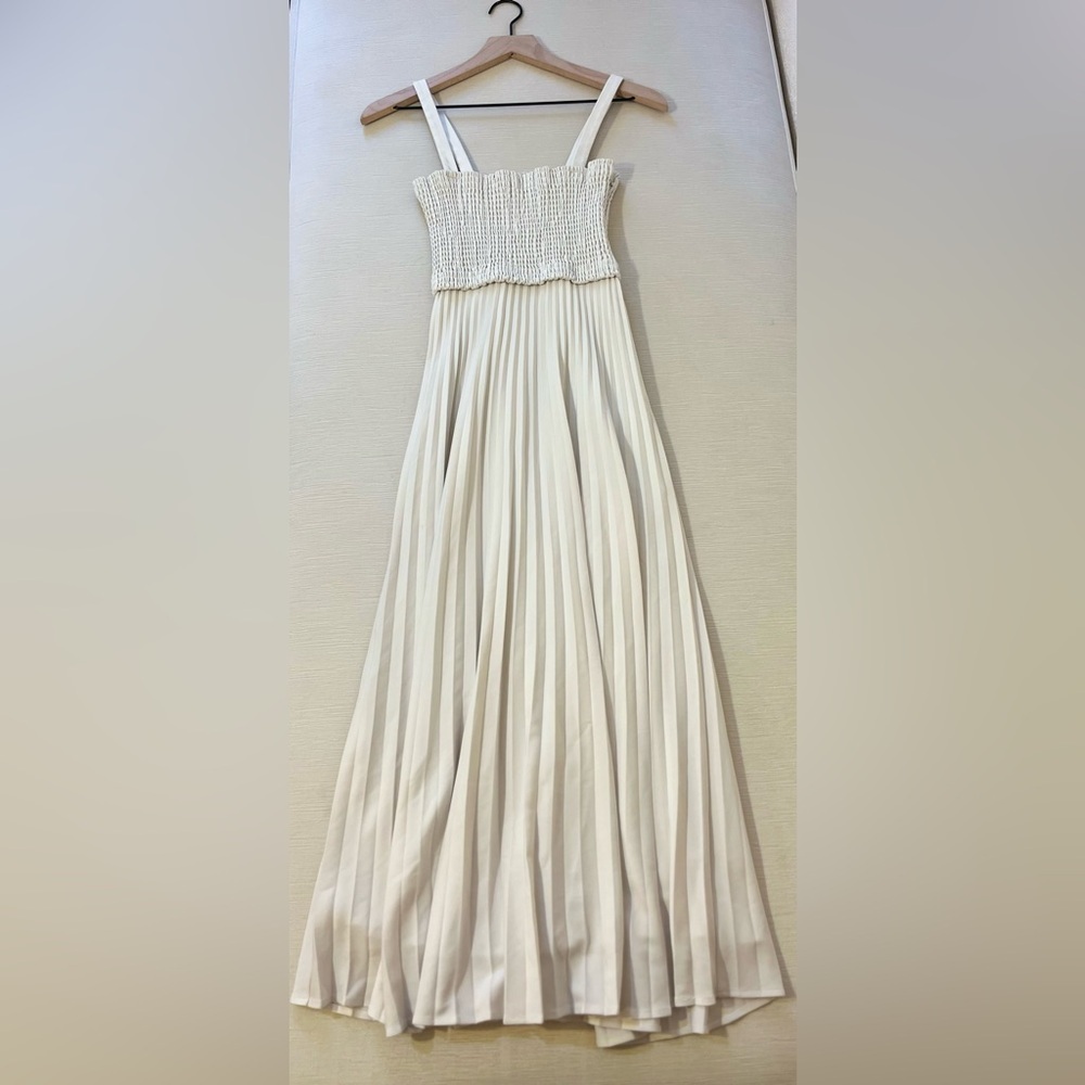 Proenza Schouler pleated maxi dress with quiet luxury resort chic vibes